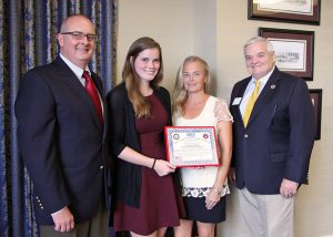 Chemical engineering student Priscilla Symmes (second from left) receives a scholarship from the USS Little Rock Association. Joining her are chemical engineering department head Bill Elmore (far left), her mother Susan Symmes and Bill Stankiewicz, president of the USS Little Rock Association.